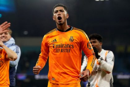 Real Madrid's Jude Bellingham celebrates scoring a last-minute winner against Manchester City.