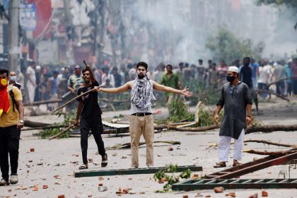 Protesters clash with Border Guard Bangladesh (BGB) and the police outside the state-owned Bangladesh Television in Dhaka, Bangladesh, July 19, 2024.