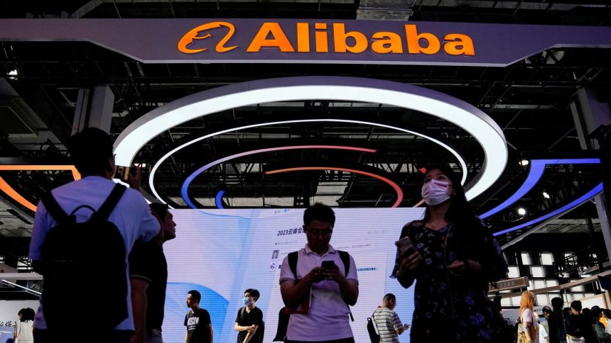 An Alibaba Group sign is seen at the World Artificial Intelligence Conference in Shanghai, China, on  July 6, 2023.