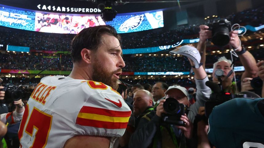 Kansas City Chiefs tight end Travis Kelce on the field after losing to the Philadelphia Eagles in Super Bowl LIX.