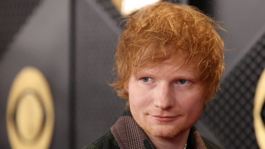 Ed Sheeran poses on the red carpet at the 66th Annual Grammy Awards in Los Angeles, on February 4, 2024.