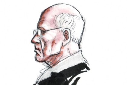 French ex-surgeon Joel Le Scouarnec, accused of the aggravated rape and sexual assault against hundreds of children during three decades, is seen in this courtroom sketch during his March 2020 trial at the courthouse in Saintes, France.