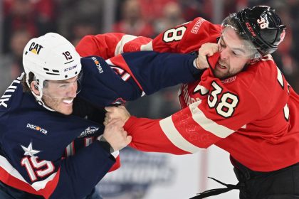 Team USA's Matthew Tkachuk fights with Brandon Hagel of Team Canada during the first period in the 4 Nations Face-Off game at the Bell Centre on February 15 in Montreal.