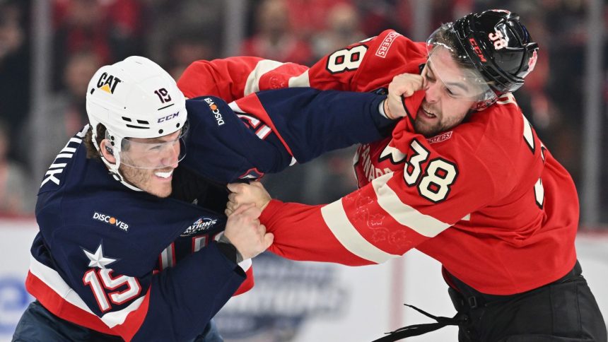 Team USA's Matthew Tkachuk fights with Brandon Hagel of Team Canada during the first period in the 4 Nations Face-Off game at the Bell Centre on February 15 in Montreal.