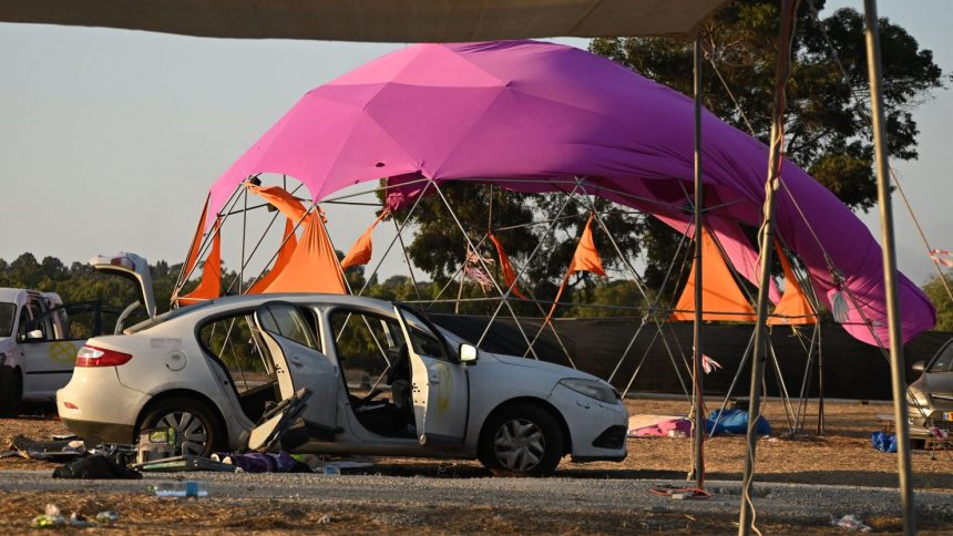 RE'IM, ISRAEL - OCTOBER 12: A general view at the Supernova Music Festival site where hundreds were killed and dozens taken by Hamas militants near the border with Gaza on October 12, 2023 in Kibbutz Re'im , Israel. Israel has sealed off Gaza and launched sustained retaliatory air strikes, which have killed at least 1,200 people with more than 300, 000 displaced, after a large-scale attack by Hamas. On October 7, the Palestinian militant group Hamas launched a surprise attack on Israel from Gaza by land, sea, and air, killing over 1,200 people and wounding around 2800. Israeli soldiers and civilians have also been taken hostage by Hamas and moved into Gaza. The attack prompted a declaration of war by Israeli Prime Minister Benjamin Netanyahu and the announcement of an emergency wartime government. (Photo by Leon Neal/Getty Images)