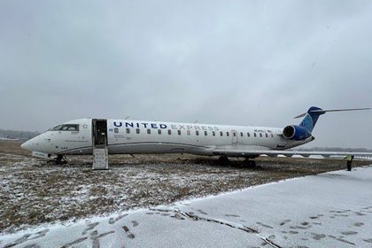 A plane carrying 27 passengers, including crew, slid off the taxiway and came to a stop on a grassy area at St. Louis Lambert International Airport on Wednesday.