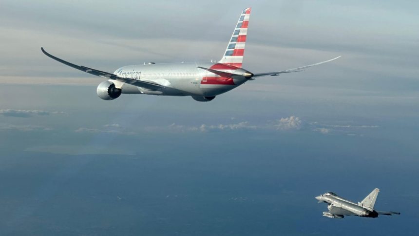 An Italian Air Force photo shows a jet escorting an American Airlines plane to Rome on Sunday, February 23, 2025.