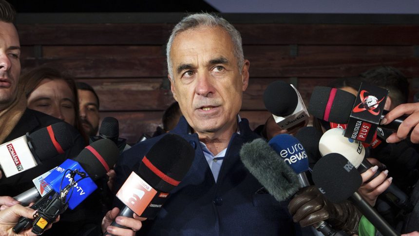 Calin Georgescu speaks to the media in Izvorani, Romania, on November 26.