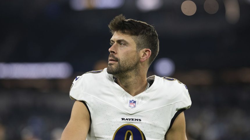 Justin Tucker walks back to the locker room after the Baltimore Ravens' game against the Los Angeles Chargers on Monday, November 25, 2024.