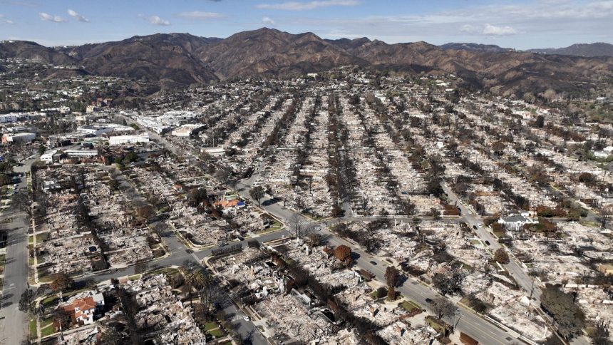 The devastation from the Palisades Fire is shown in an aerial view in the Pacific Palisades neighborhood of Los Angeles, Monday, Jan. 27, 2025.