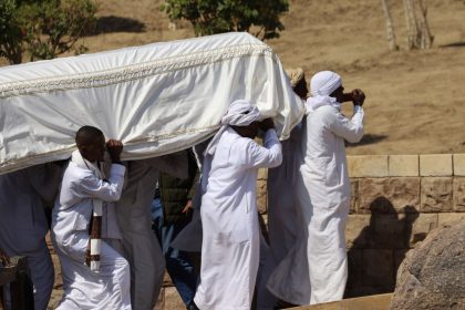 People carry the coffin of Prince Karim Al-Hussaini, the Aga Khan IV and 49th hereditary imam of the Shiite Ismaili Muslims, who died Tuesday in Portugal, to be buried at the Aga Khan mausoleum, in Aswan, Egypt, on Feb. 9, 2025.