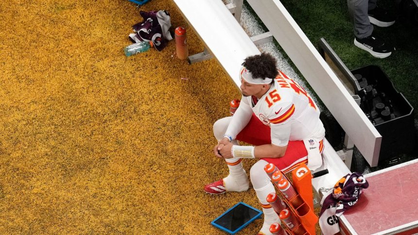 Kansas City Chiefs quarterback Patrick Mahomes sits on the bench during the first half of the NFL Super Bowl 59 against the Philadelphia Eagles