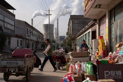 A coal-fired power plant seen from a street in Dingzhou, Baoding, in the northern China's Hebei province on November 10, 2023