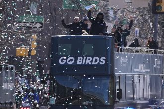 Players and coaches celebrate during the Philadelphia Eagles' NFL football Super Bowl 59 parade and celebration, Friday, Feb. 14, 2025, in Philadelphia.