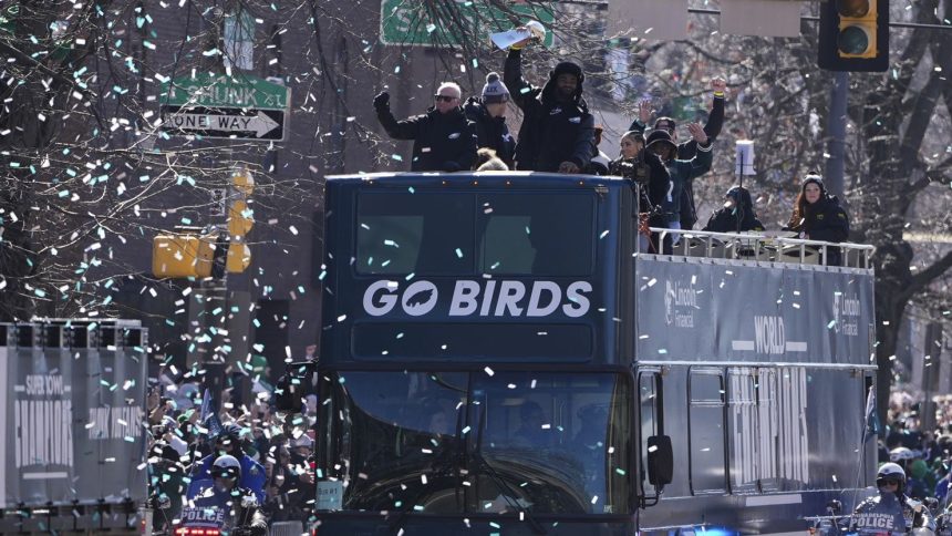 Players and coaches celebrate during the Philadelphia Eagles' NFL football Super Bowl 59 parade and celebration, Friday, Feb. 14, 2025, in Philadelphia.