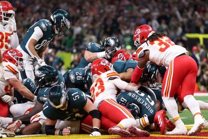 Philadelphia Eagles quarterback Jalen Hurts scores a touchdown on the "Tush Push" play during the team's Super Bowl win against the Kansas City Chiefs.