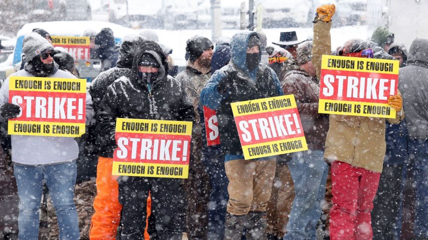 Officers at Auburn Correctional Facility in Auburn, New York, stood in inclement weather Wednesday to protest unsafe working conditions.