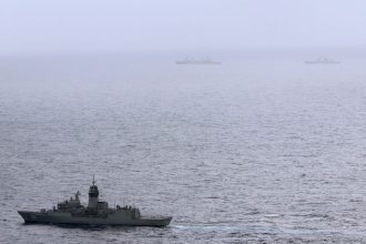 The HMAS Arunta, left, shadows the People's Liberation Army-Navy Jiangkai-class frigate Hengyang and a Fuchi-class replenishment vessel in the Tasman Sea, on February 13, 2025