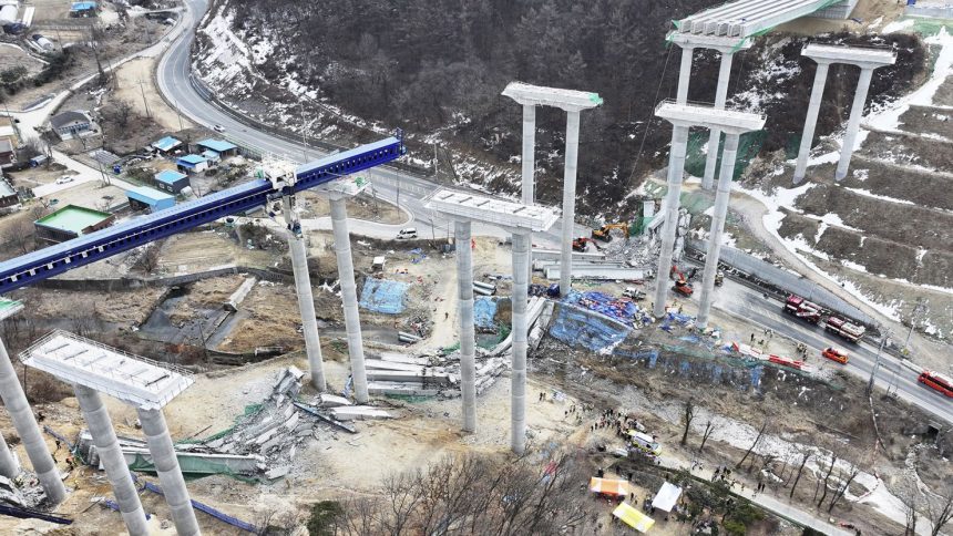 Elevated parts of a highway under construction collapsed on Tuesday in Cheonan, South Korea.