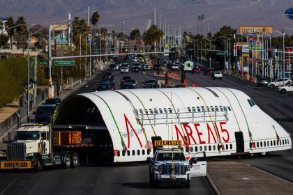 A section of a 747 airplane moves through Las Vegas streets on the way to a new home at Area 15 where it will be part of an immersive art display, on Wednesday, Feb. 26, 2025.