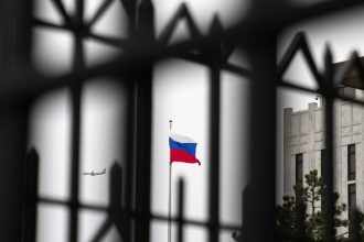 The Russian flag flies above the Embassy of the Russian Federation in Washington, DC, in February 2022.