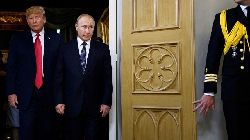 President Donald Trump, left, and and Russia President Vladimir Putin arrive for a meeting in Helsinki on July 16, 2018.