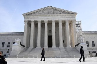 Police stand in front of the US Supreme Court in Washington, DC, on January 10.