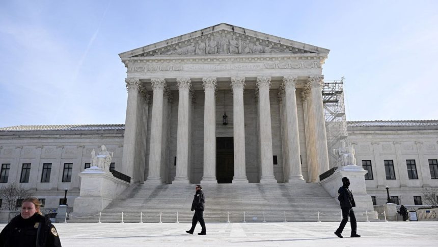 Police stand in front of the US Supreme Court in Washington, DC, on January 10.