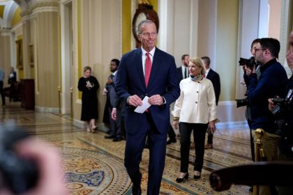 Senate Majority Leader John Thune arrives to speak to reporters following a weekly Republican policy luncheon at the US Capitol on February 19, in Washington, DC.