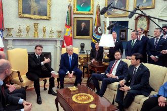 President Donald Trump meets with French President Emmanuel Macron in the Oval Office at the White House on February 24, in Washington, DC.