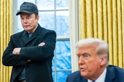 Elon Musk speaks to reporters alongside President Donald Trump during an executive order signing in the Oval Office of the White House in Washington, DC, on February 11.