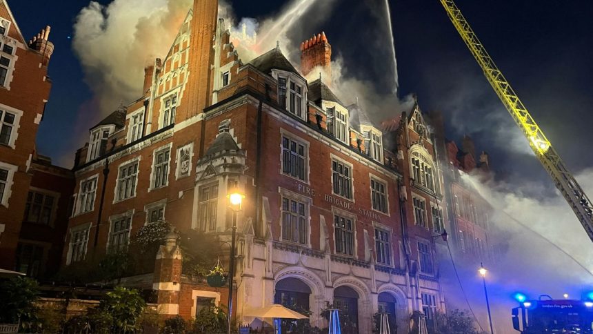 Firefighters put out the blaze on London's Chiltern Street on Friday.