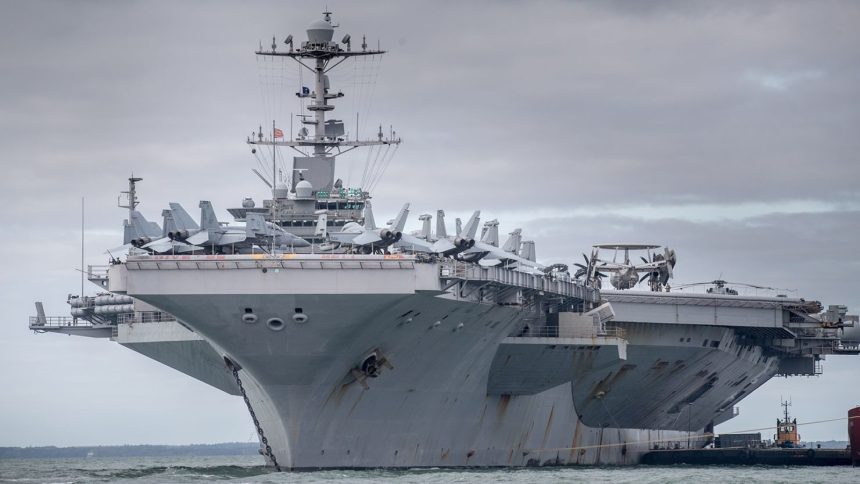 The US warship USS Harry S. Truman is pictured anchored in The Solent on October 8, 2018, near Portsmouth, England.