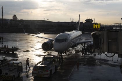 A plane sits on the tarmac at LaGuardia Airport in New York.