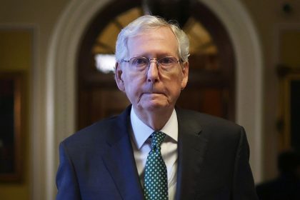 Sen. Mitch McConnell passes through a hallway at the US Capitol on April 17, 2024 in Washington, DC.