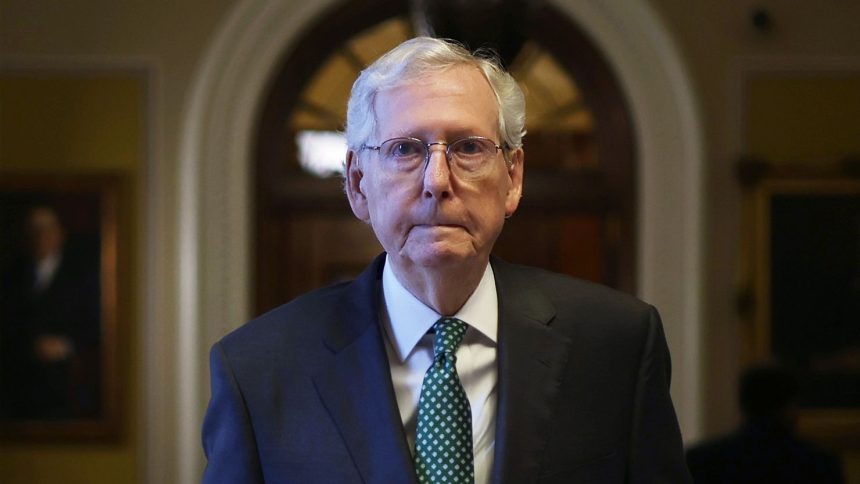 Sen. Mitch McConnell passes through a hallway at the US Capitol on April 17, 2024 in Washington, DC.