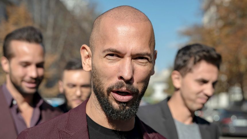 Andrew Tate talks to reporters outside the Court of Appeal on October 15, 2024 in Bucharest, Romania.