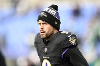 Ravens kicker Justin Tucker warms up prior to Baltimore's game against the Philadelphia Eagles on December 1, 2024.