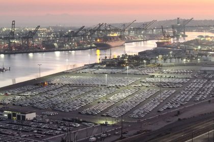 An aerial view of newly imported cars parked at the automobile terminal at the Port of Los Angeles on December 4, 2024 in Wilmington, California.