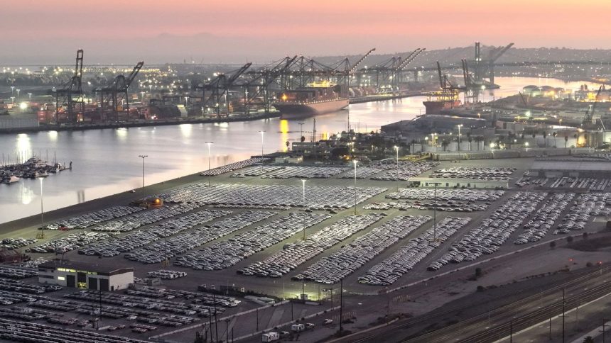 An aerial view of newly imported cars parked at the automobile terminal at the Port of Los Angeles on December 4, 2024 in Wilmington, California.