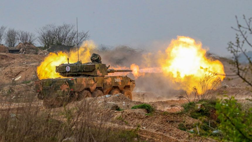 An assault vehicle unit carries out a fire strike during actual combat training in Ningbo, China, on January 10, 2025.