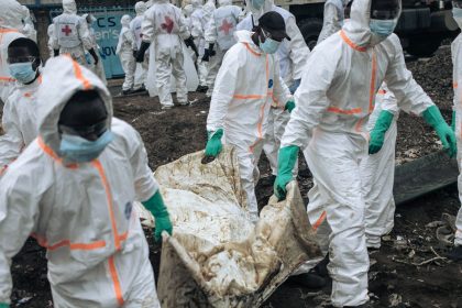 Members of the Congolese Red Cross and Civil Protection bury victims of the recent clashes in a cemetery in Goma, eastern DRC, on February 3, 2025.