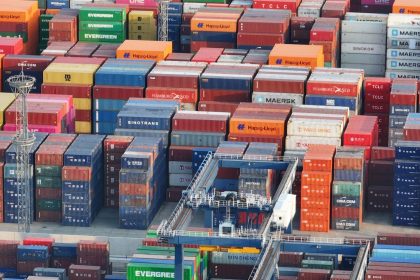 Trucks carry containers at a port in Nanjing, China earlier this month.