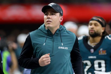 Offensive coordinator Kellen Moore jogs off the field at halftime before the Philadelphia Eagles' Super Bowl LIX victory over the Kansas City Chiefs at Caesars Superdome in New Orleans.