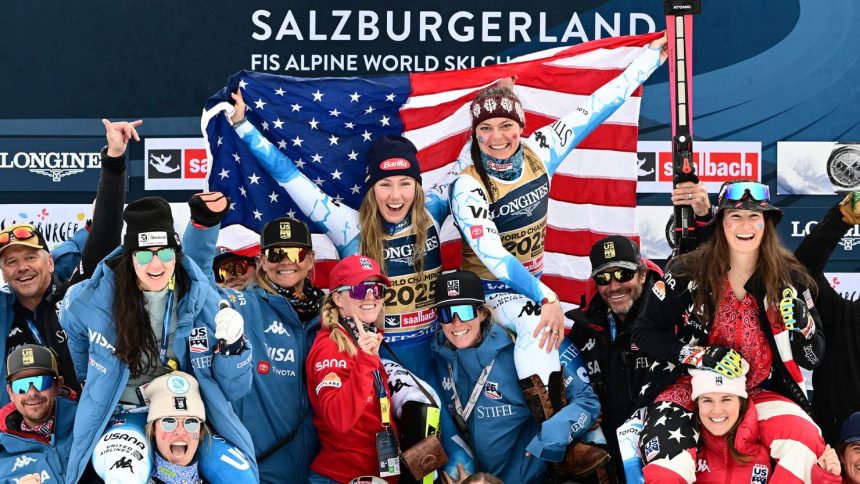 Shiffrin and Breezy Johnson (center) celebrate world championships gold in the women's team combined event.