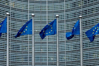 European flags fly in front of the Berlaymont building, which houses the headquarters of the European Commission on February 11, 2025 in Brussels, Belgium.