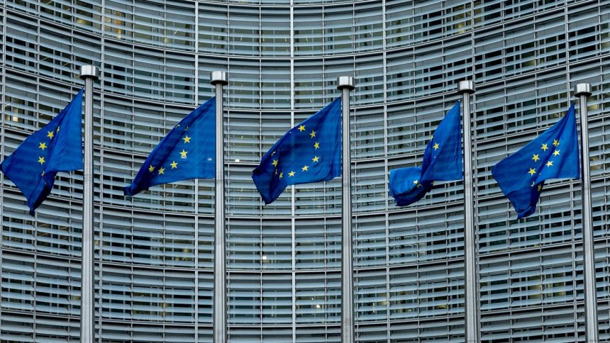 European flags fly in front of the Berlaymont building, which houses the headquarters of the European Commission on February 11, 2025 in Brussels, Belgium.