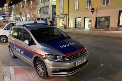 Police are seen after a knife attack near the main square in the city centre of Villach, southern Austria on February 15, 2025.