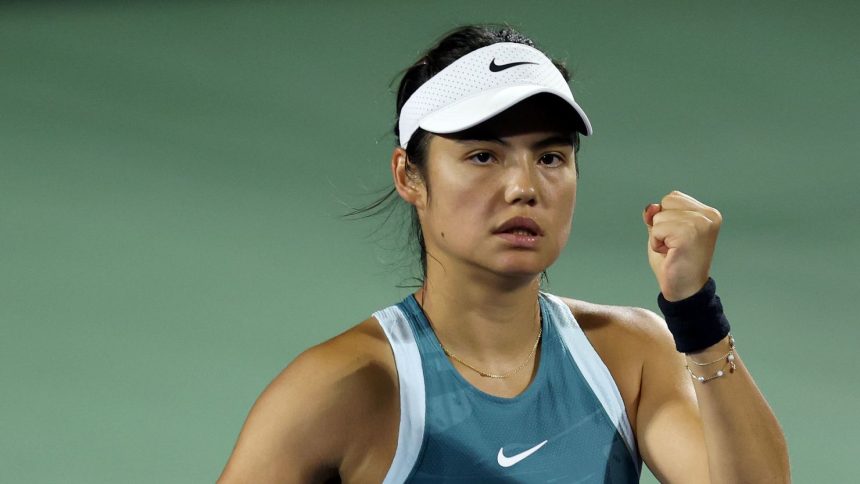 Raducanu celebrates winning a point against Karolína Muchová at the Dubai Tennis Championships.