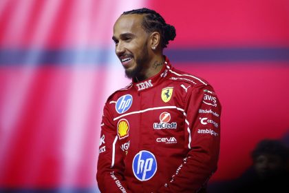 Lewis Hamilton smiles during a launch event at the O2 Arena in London, England.